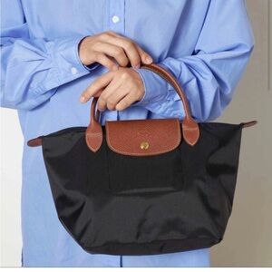 Longchamp Le Pliage Tote in black with brown accents